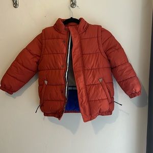 Mini Boden, 2 in 1 padded coat. Sleeves zip off, missing the hood.